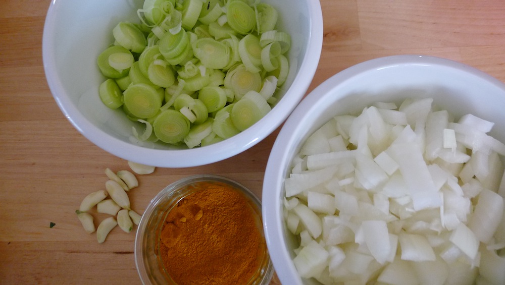 First add onion, leek, garlic and turmeric.